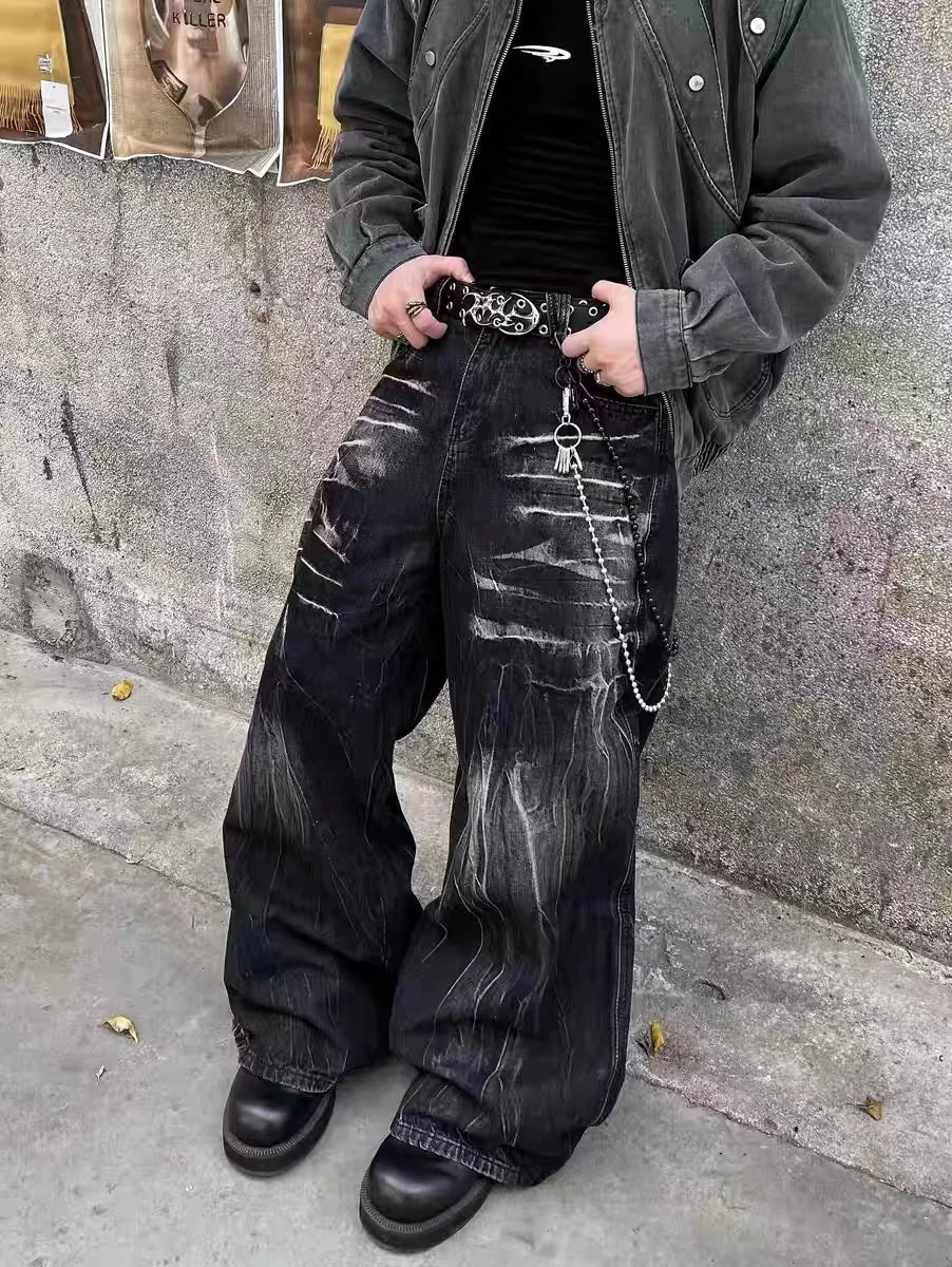 VOIDWEAR SIGNAL_STORM_11 ☰ black lightning jeans shown in Los Angeles alleyway — washed denim texture and storm pattern visible under sunlight.