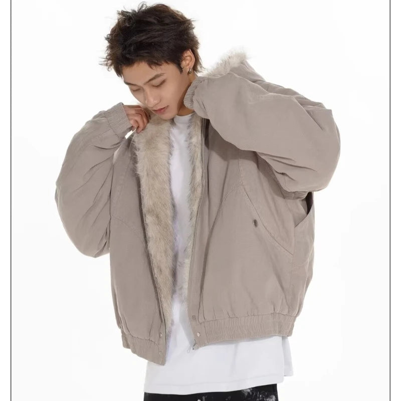 VOIDWEAR™ VDR_25 — a unisex oversized plush hooded jacket. Person wearing a beige jacket with fur lining on a white background